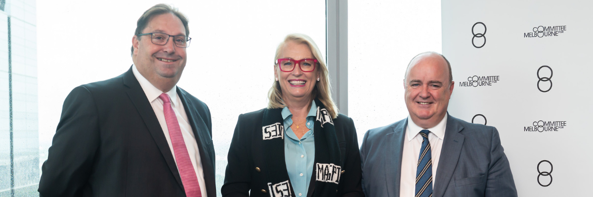 David Sinn, Sally Capp AO and Mark Melvin stand together smiling 